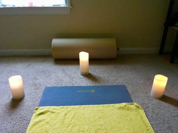 Yin yoga, candles, yoga mat